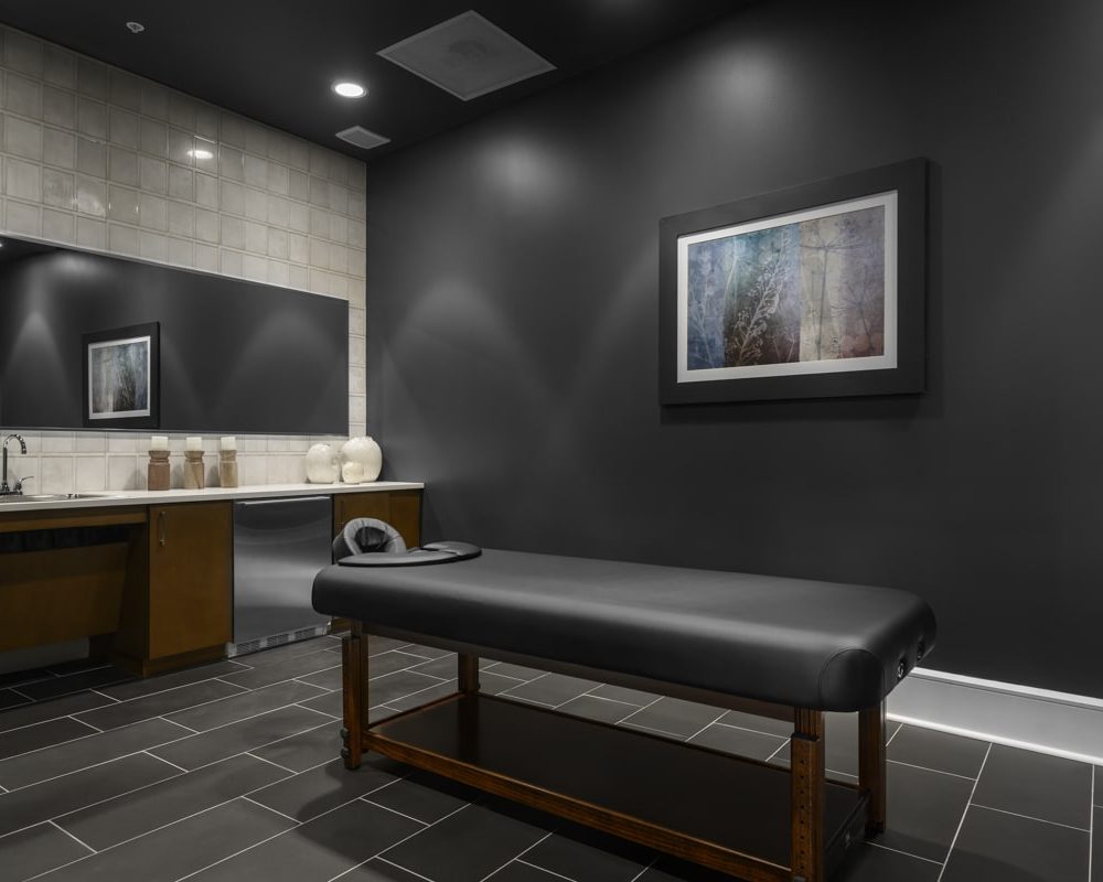 Denver Luxury Apartments for Rent - DECO Apartments Private Massage Room With Massage Table and Modern Finishes