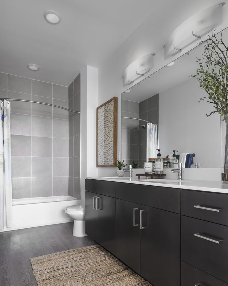 Luxury Apartments for Rent in Denver - DECO Apartments Bathroom With Dual Shower/Tub and Modern Finishes